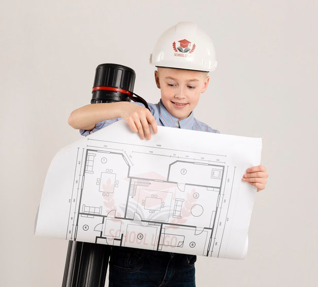 Portrait Of Young Boy Posing As Architect Psd