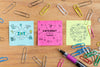Post It On Table Surrounded By Paperclips Psd