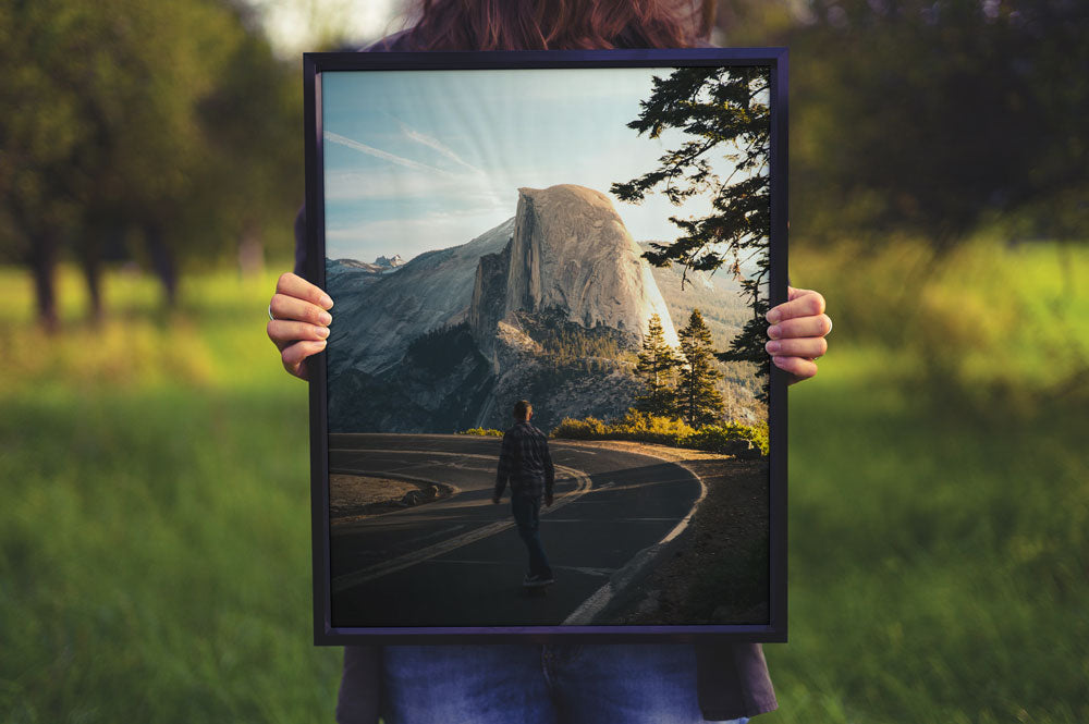 Women Holding a Poster Frame Mockup