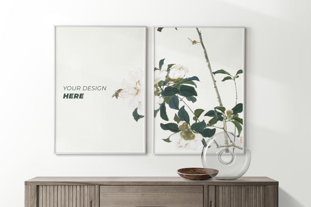 Poster Frame Mockup Hanging On Wall Psd