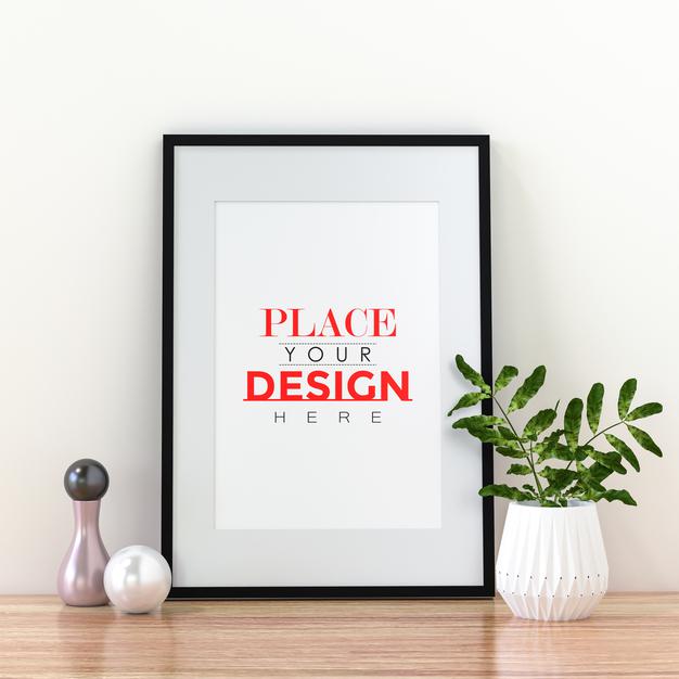 Poster Frame Mockup On The Wall With Plant Psd