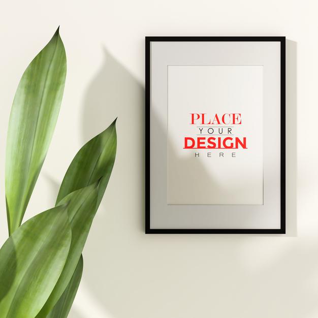 Poster Frame Mockup On The Wall With Plant Psd