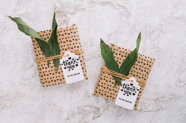 Present Box Mockup With Leaves Psd