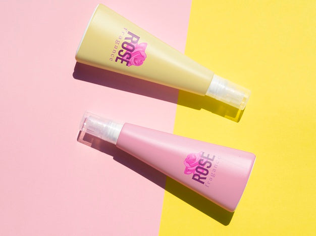 Product Design With Pink Bottles Mock-Up On Bicolor Background Psd