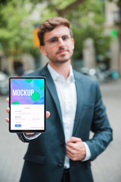 Professional Businessman Holding A Tablet Psd