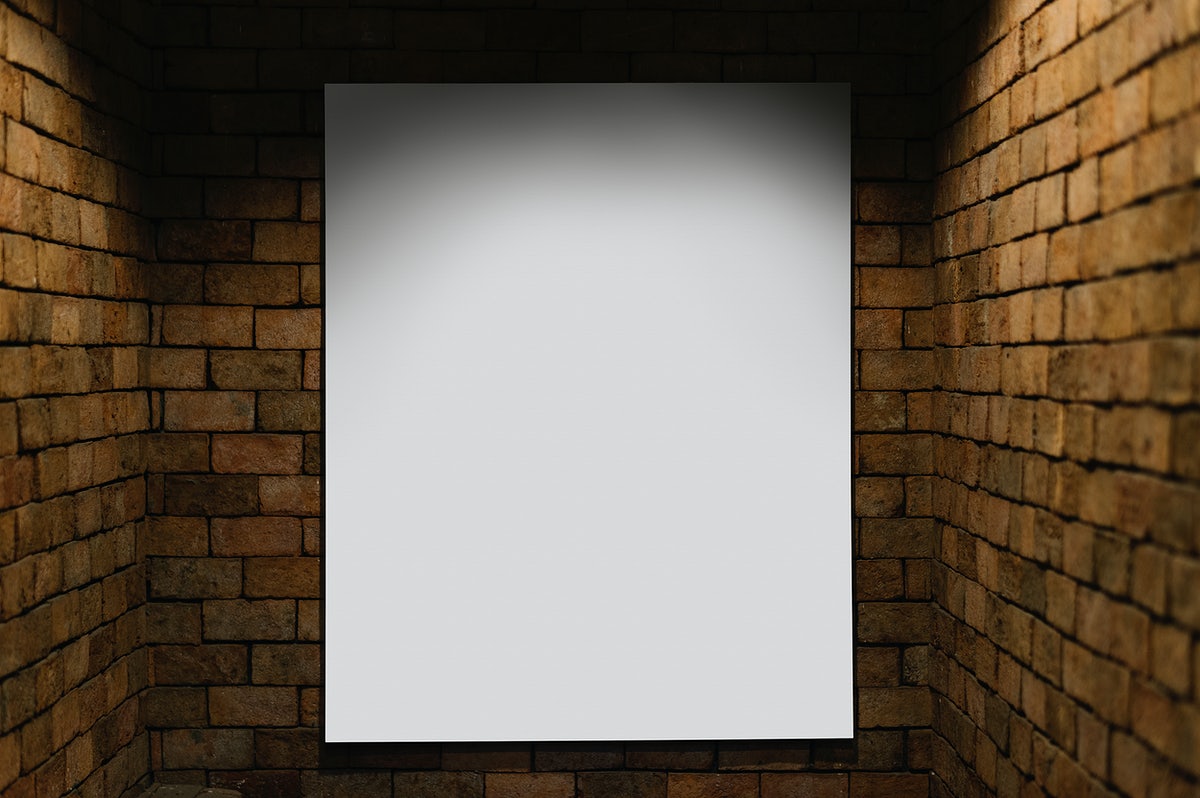 Projector Mockup Against A Brick Wall