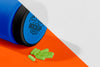 Protein Blue Bottle And Green Pills Mock-Up Psd