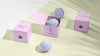 Purple Bath Bombs In Pink Boxes Psd