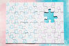 Puzzle Pieces On Pink And Blue Background Psd
