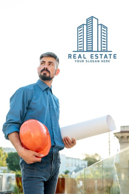 Real Estate Agent Holding Plans For The New Building Psd