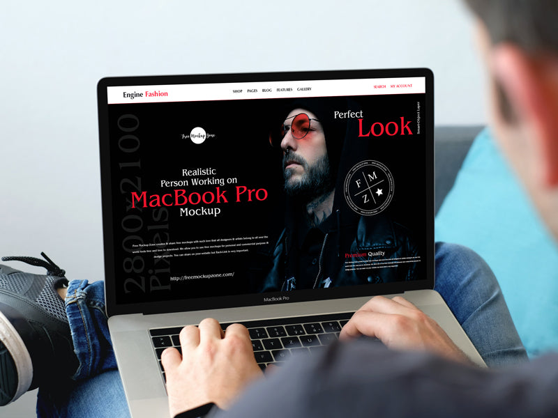 Realistic Person Working On Macbook Pro Mockup