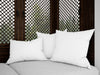 Realistic White Cushions On A Rustic Sofa Psd