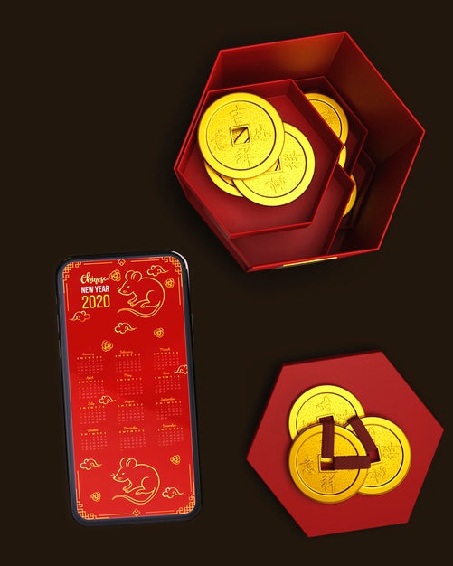 Red Boxes With Decorations And Mobile Beside Psd
