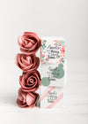 Red Roses Next To Colorful Blocks Psd