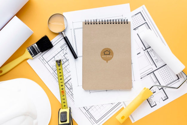 Repairing Tools With Notepad Mock-Up On Orange Background Psd