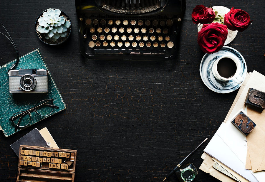 Retro Typewriter Machine With Paper On Workspace