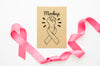 Ribbon And Fist Cancer Awareness Mock-Up Psd