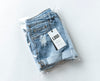 Ripped Jean Shorts With A Tag Mockup Psd