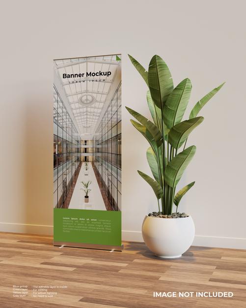 Roll Up Banner Mockup In Interior Scene With A Plant Beside It Psd