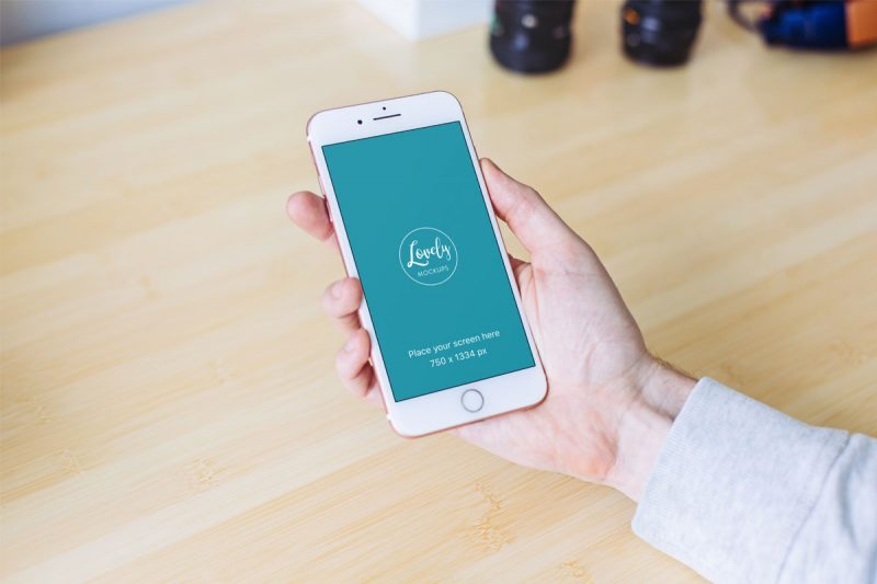 Rose Gold iPhone 8 in Mans Hand Mockup