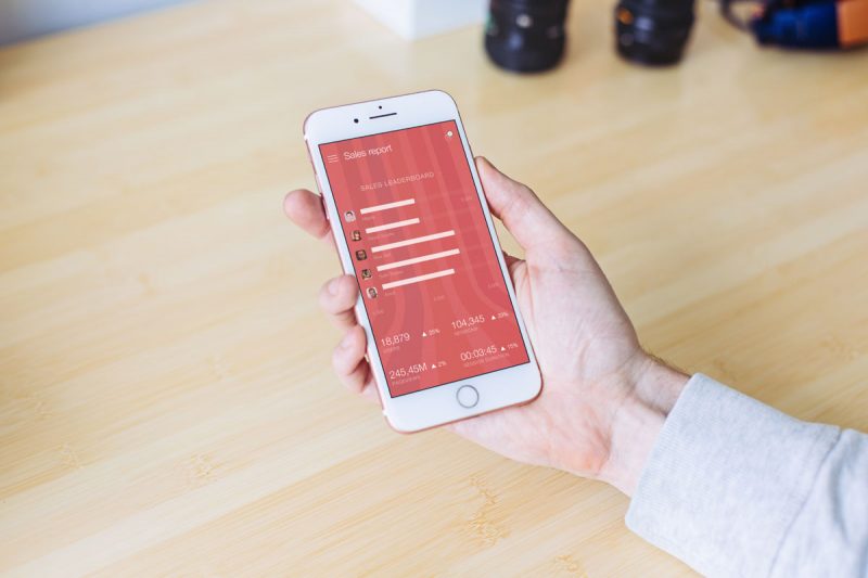 Rose Gold iPhone 8 in Mans Hand Mockup