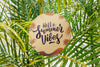 Round Paper Mockup On Palm Leaves Background Psd