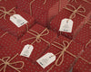 Same Sized Gifts Wrapped In Red Paper Psd