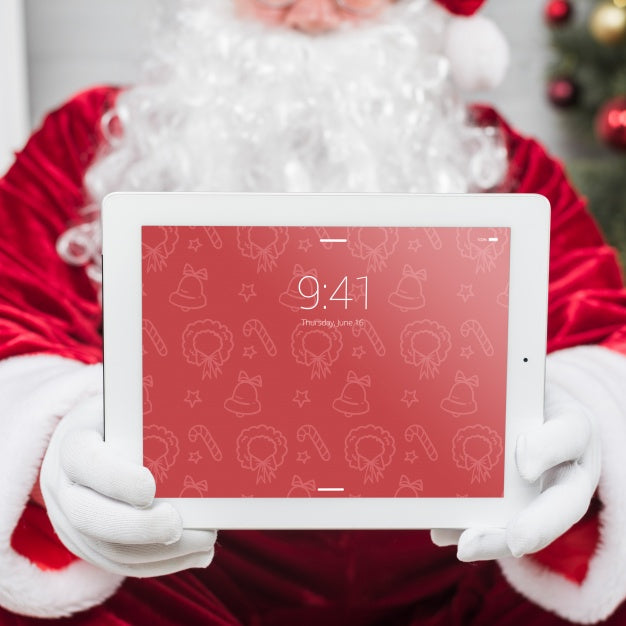Santa Presenting Tablet Mockup Psd