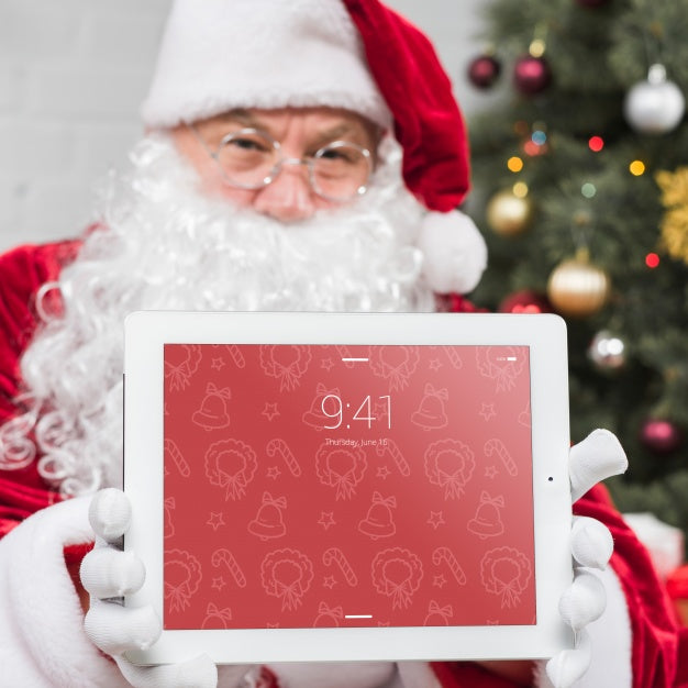 Santa Presenting Tablet Mockup Psd