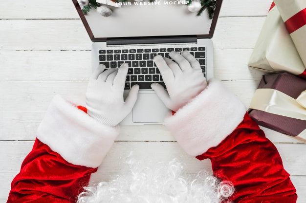 Santa Typing On Laptop Psd