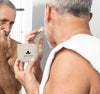 Senior Man Applying Face Cream Psd