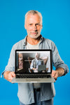 Senior Man Presenting Laptop Mockup Psd