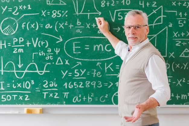 Senior Teacher With Glasses Writing On Board Psd