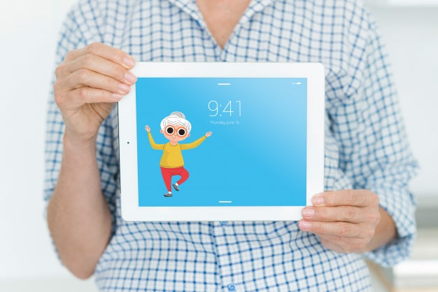 Senior Woman Holding Tablet Mockup Psd