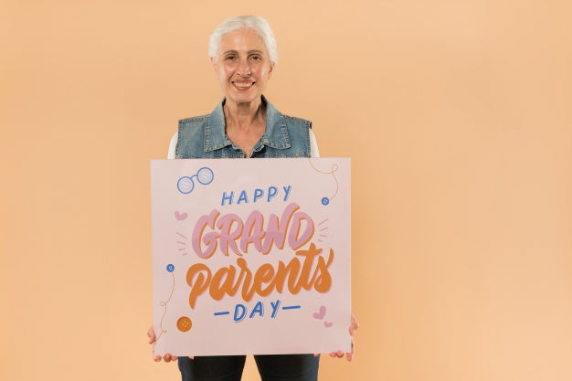 Senior Woman Presenting Board For Grandparents Day Psd