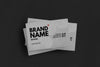 Set Of White Business Cards Over Black Surface Mockup Psd