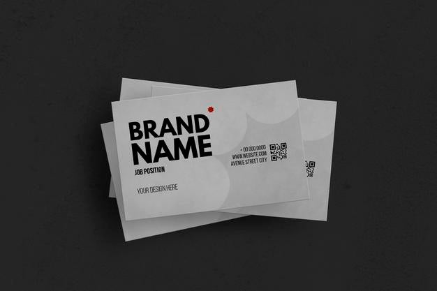 Set Of White Business Cards Over Black Surface Mockup Psd