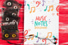 Sheet With Musical Notes Design And Tapes Beside Psd