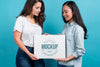 Side View Girls Holding Board Mock-Up Psd