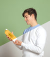 Side View Of Man Holding Juice Carton Psd