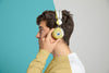 Side View Of Man Listening To Music On Headphones Psd