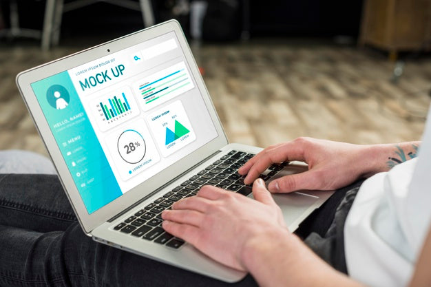 Side View Of Man Working On Laptop Psd