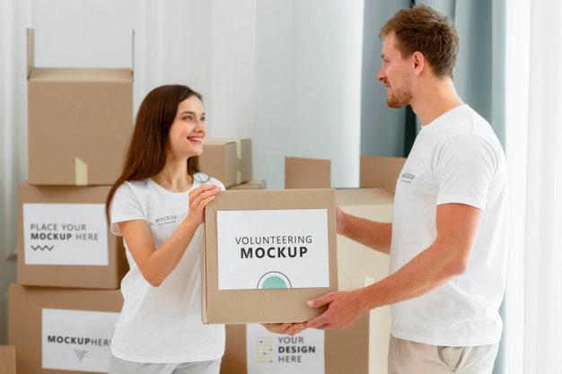 Side View Of Volunteers Handling Boxes Of Food Donations Psd