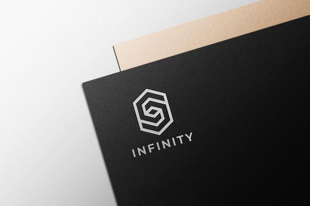Silver Logo Mockup On Black Paper Psd