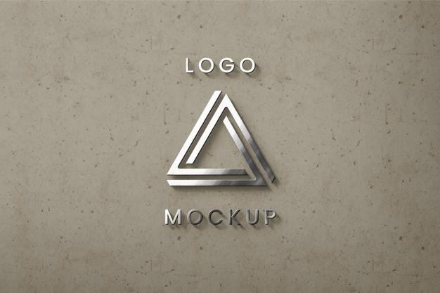Sirlver Logo On Beige Wall Mockup Psd