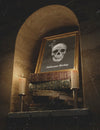 Skull In A Frame With Pile Of Books And Candles Psd
