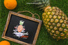 Slate And Pineapple On Grass Psd