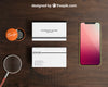 Smartphone And Badge Mockup With Stacks Of Business Cards Psd