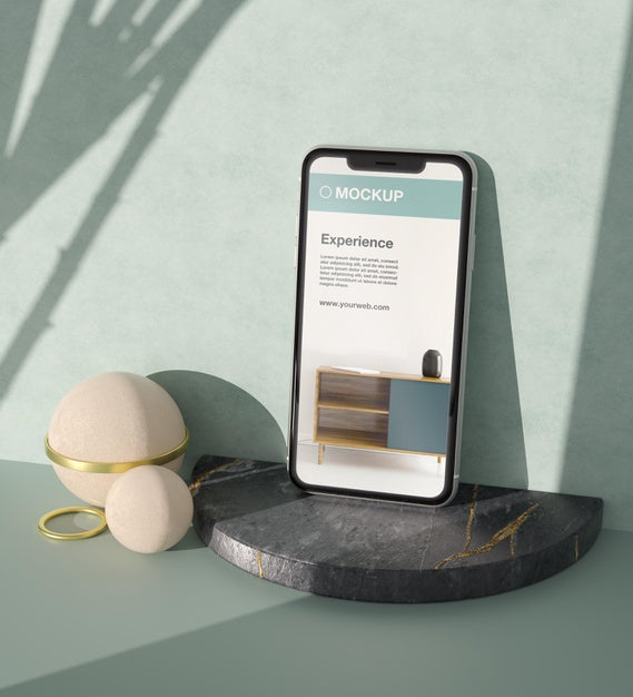 Smartphone Mock-Up Arrangement With Stone And Metallic Elements Psd