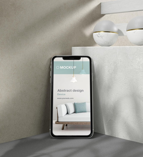 Smartphone Mock-Up Arrangement With Stone And Metallic Elements Psd